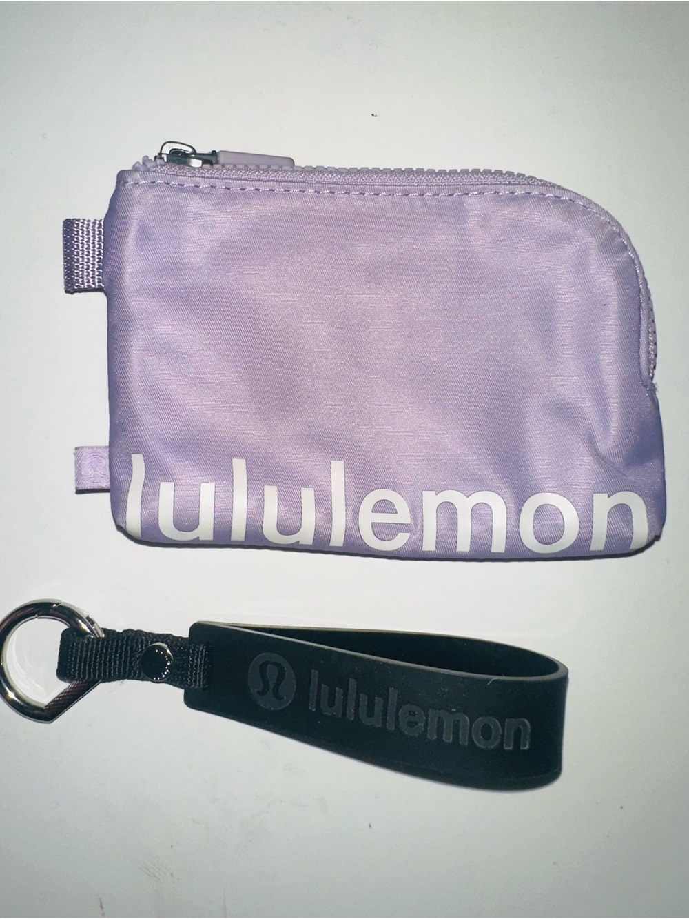 lululemon Lavender Zipper Pouch with Black Silicone Wrist Strap